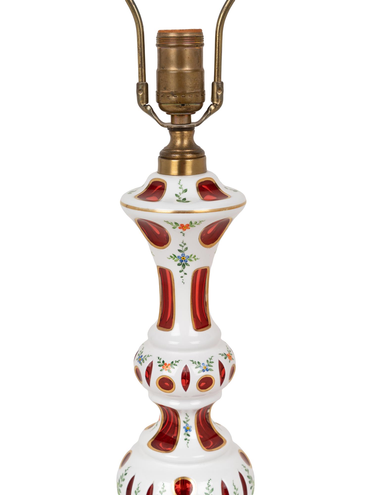 A Pair of Bohemian Enameled White Overlay Ruby Glass Lamps