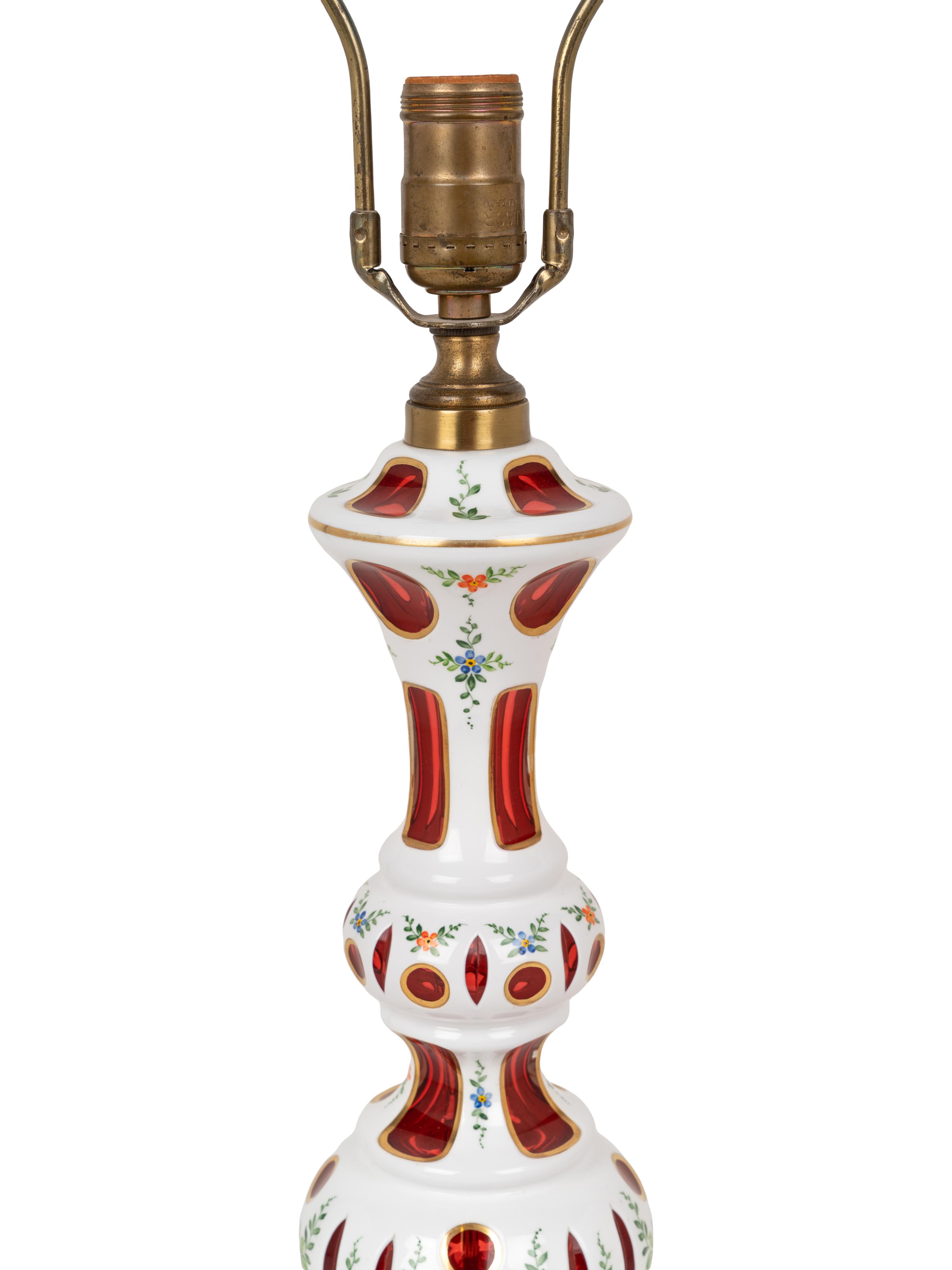 A Pair of Bohemian Enameled White Overlay Ruby Glass Lamps