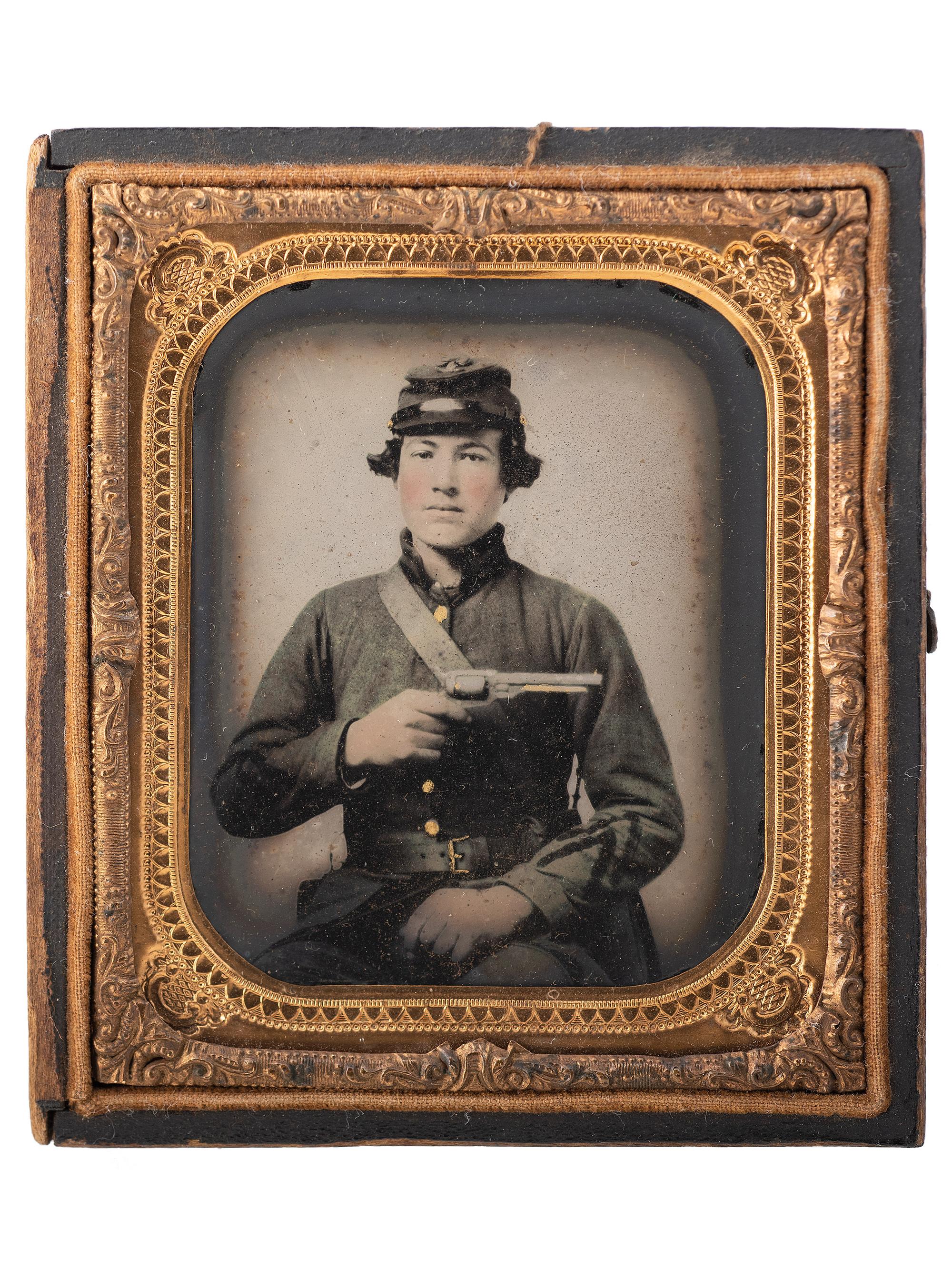 [CIVIL WAR]. Sixth plate ambrotype of CSA soldier John Adams, Jr., possibly from Company, B, 16th South Carolina Volunteers, holding a Confederate-made Spiller & Burr revolver, with civilian portrait.
