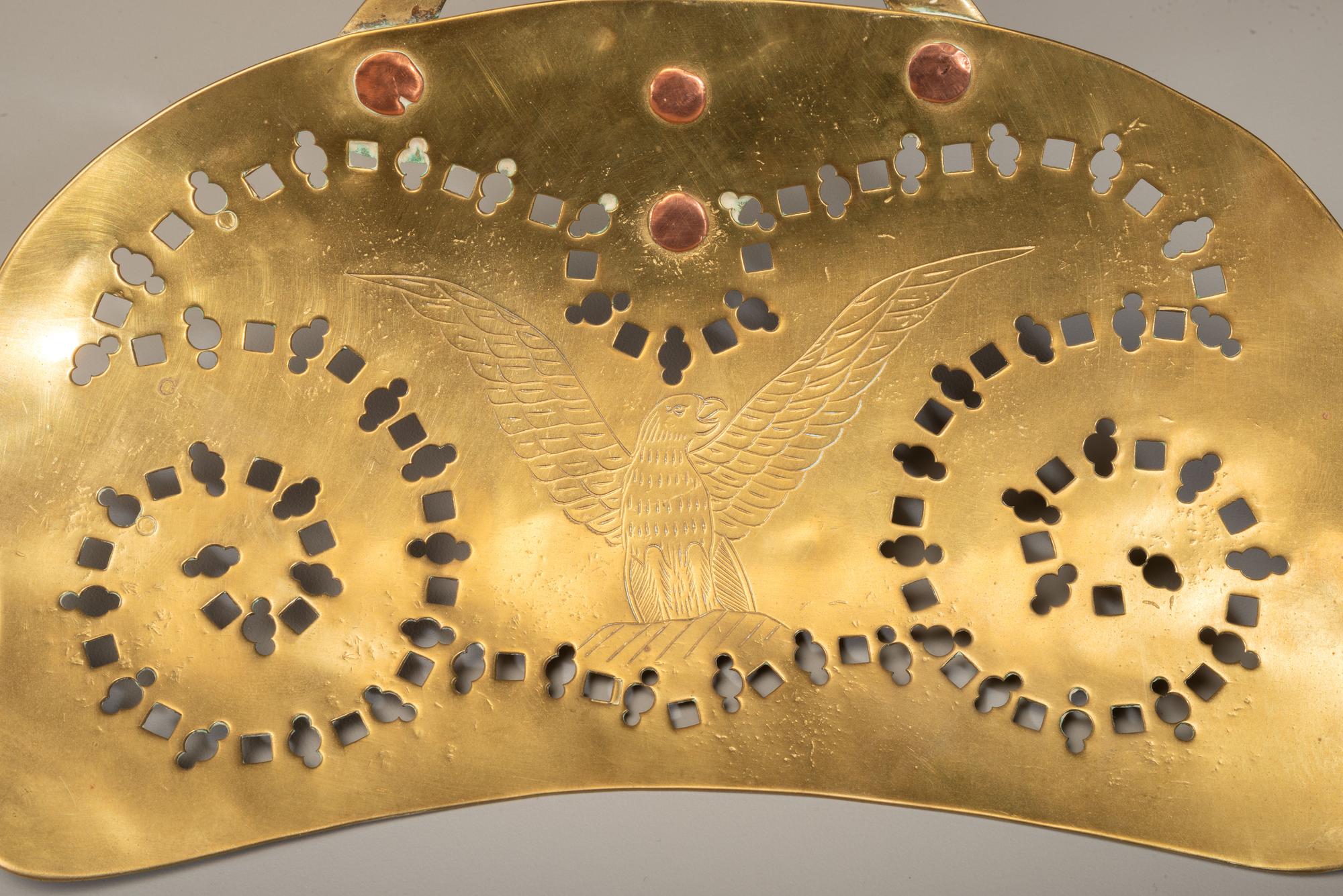 Two Pierced Brass Skimmers