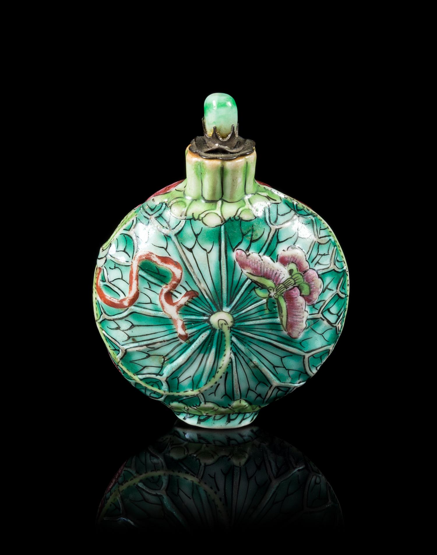 A Famille Rose Porcelain 'Lotus' Snuff Bottle Height 3 1/8 inches. — 19TH CENTURY