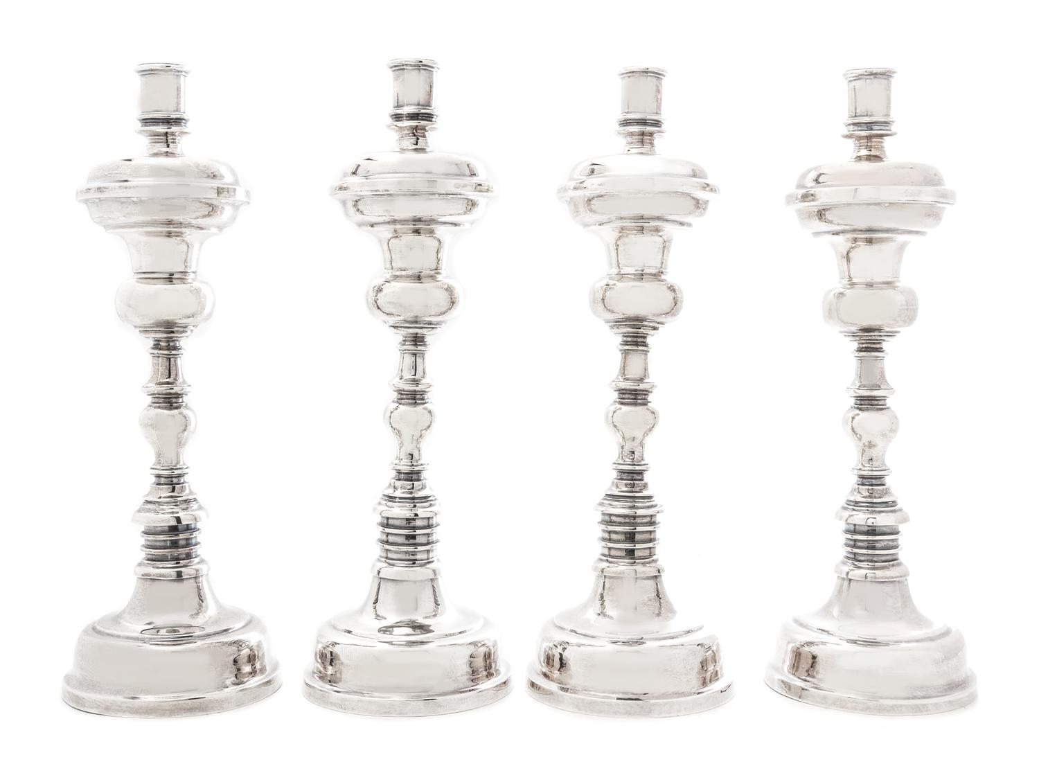 A Set of Four Mexican Silver Candlesticks, Casa Prieto, Mexico City, 1960s, each with a knopped baluster stem.