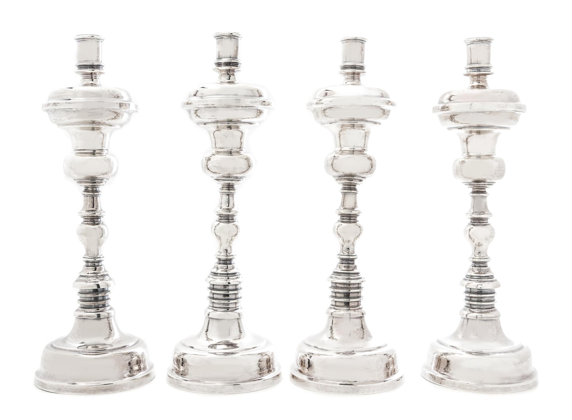 A Set of Four Mexican Silver Candlesticks, Casa Prieto, Mexico City, 1960s, each with a knopped baluster stem.