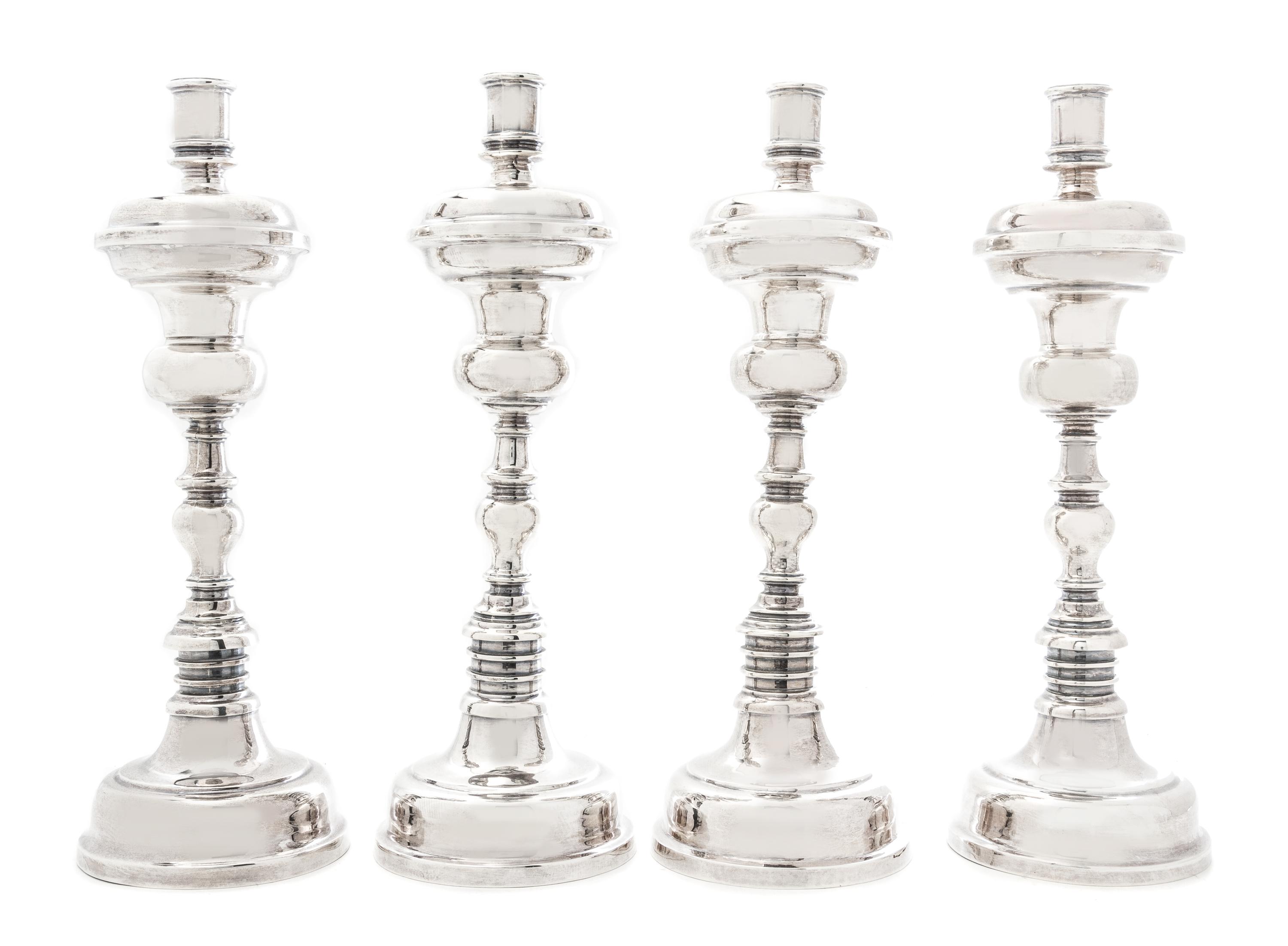 A Set of Four Mexican Silver Candlesticks, Casa Prieto, Mexico City, 1960s, each with a knopped baluster stem.