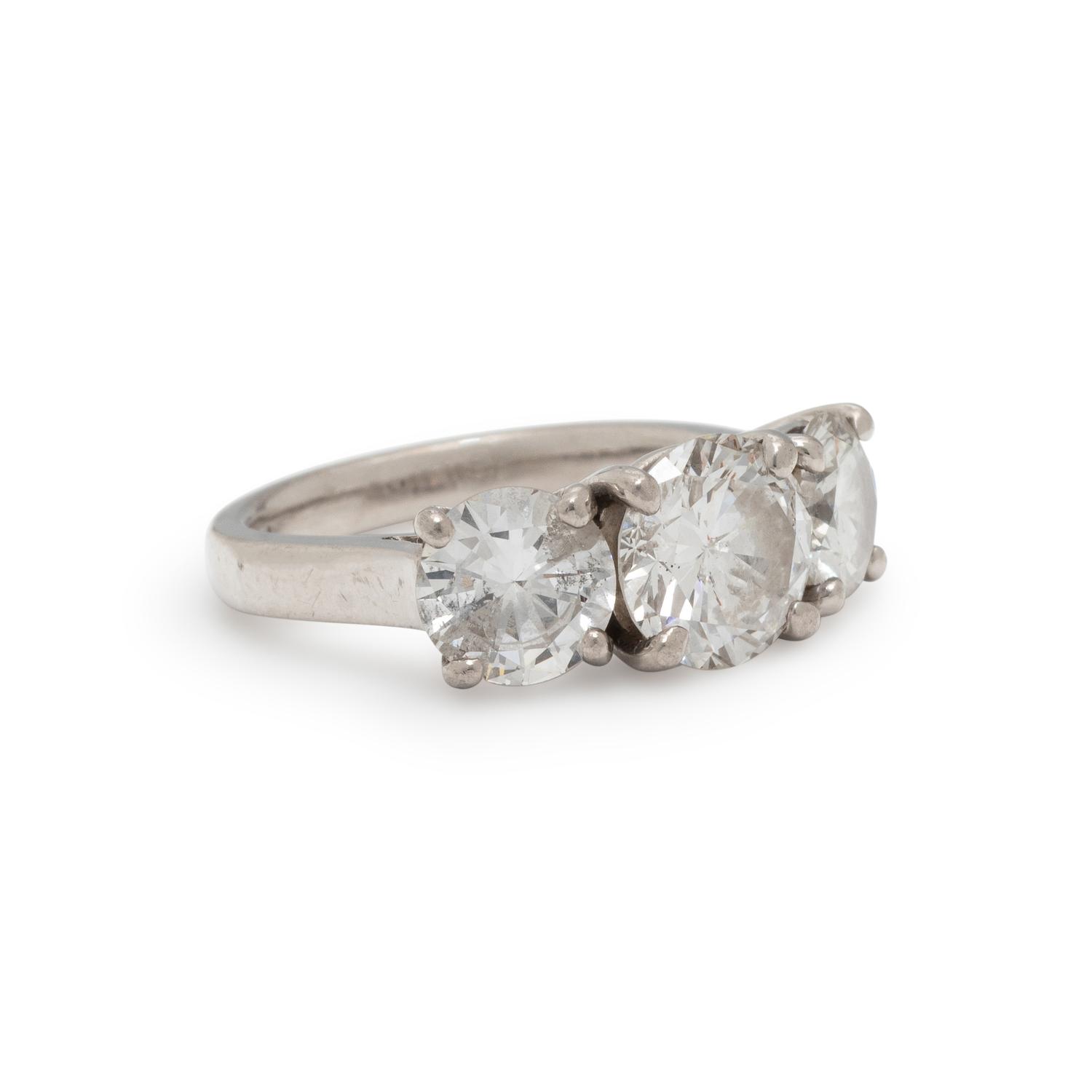 THREE-STONE DIAMOND RING