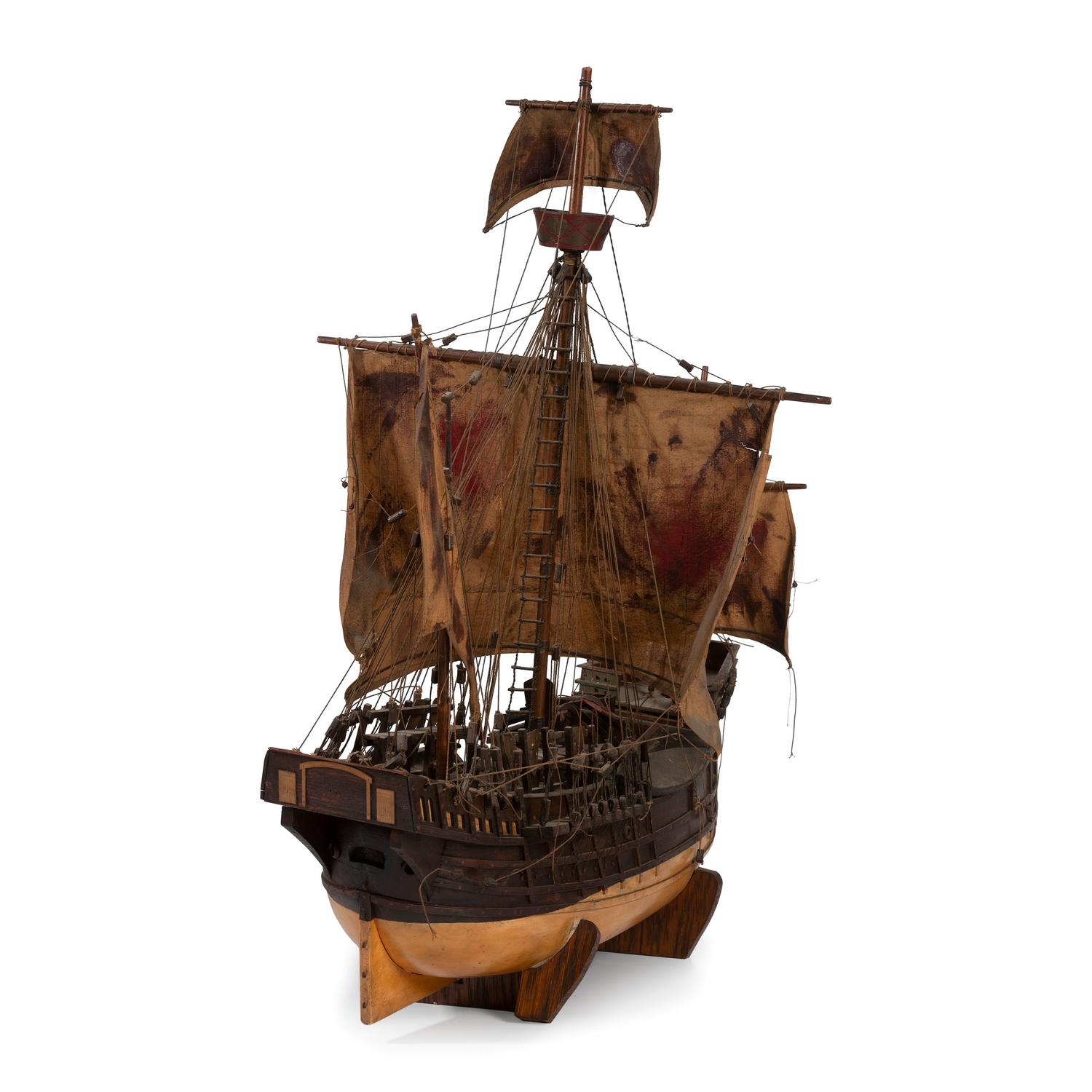 A Painted Wood and Canvas Model of a Three-Masted Ship