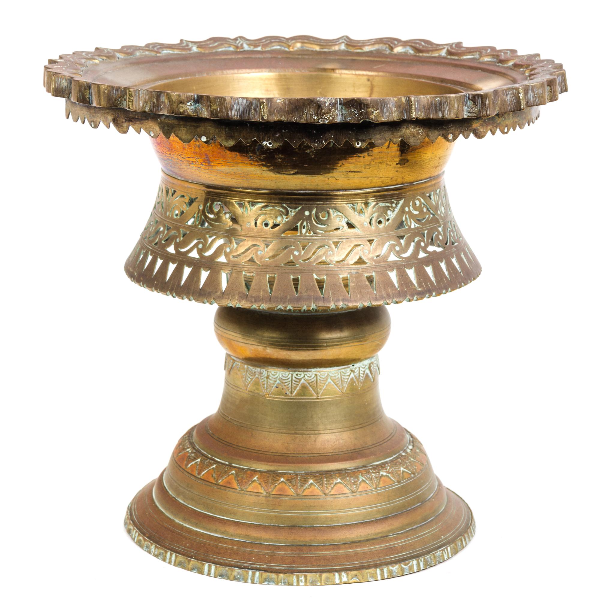 A Large Indonesian Brass Footed Bowl Height 11 inches; diameter 11 1/2 inches.