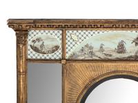 A Classical Giltwood and Eglomise-Inset Mirror