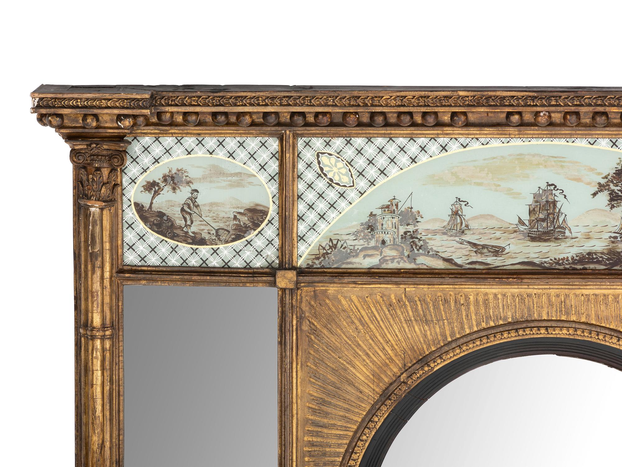 A Classical Giltwood and Eglomise-Inset Mirror