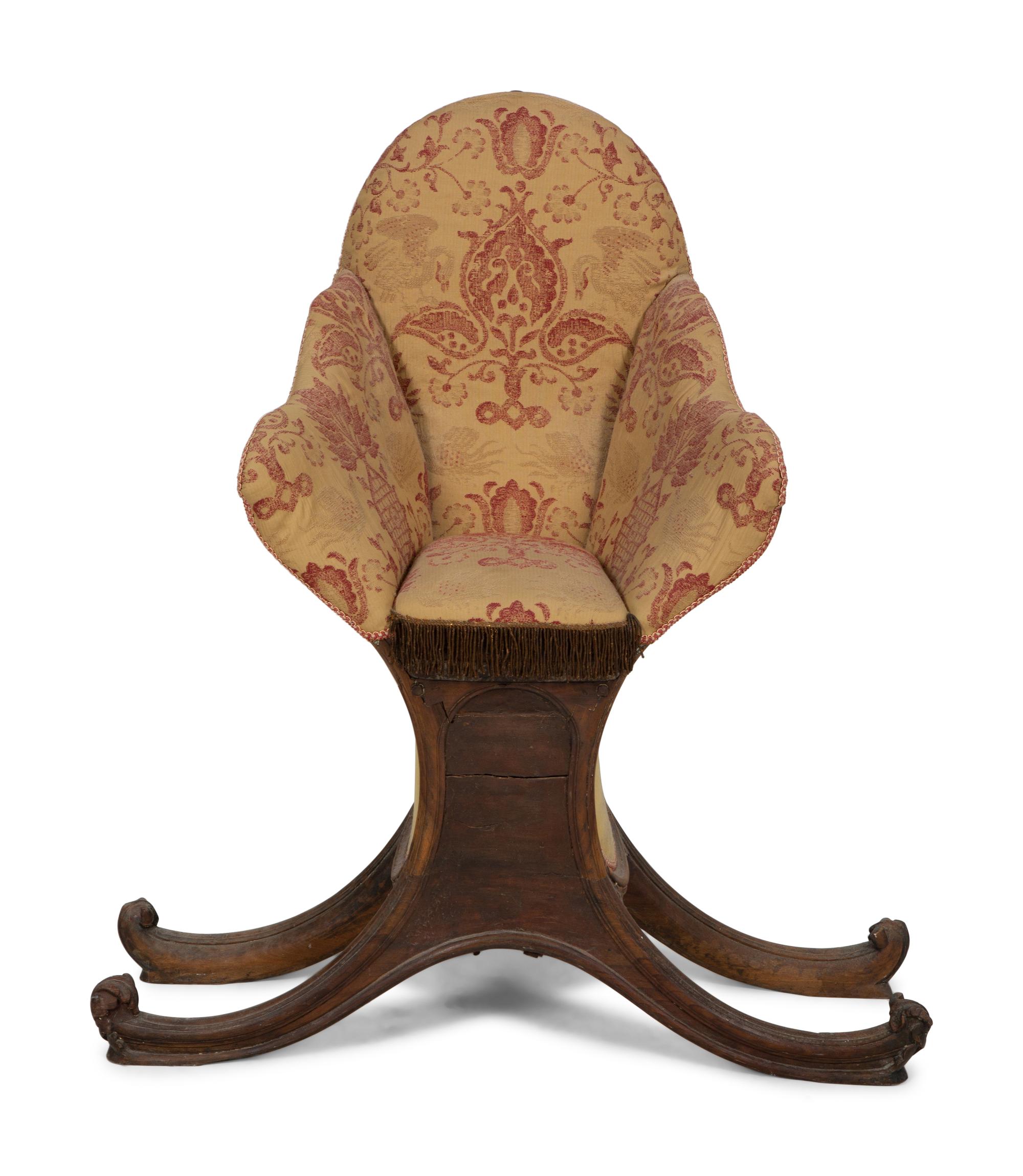 A Venetian Carved Walnut Gondola Chair