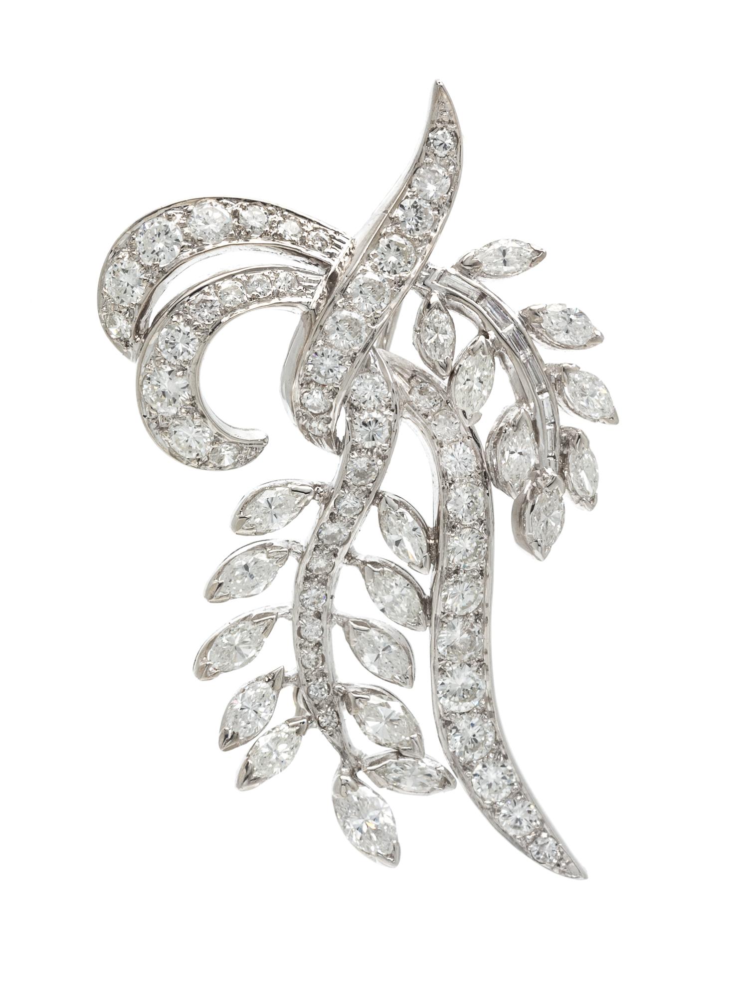 A Platinum and Diamond Pendant/Brooch, 10.90 dwts.