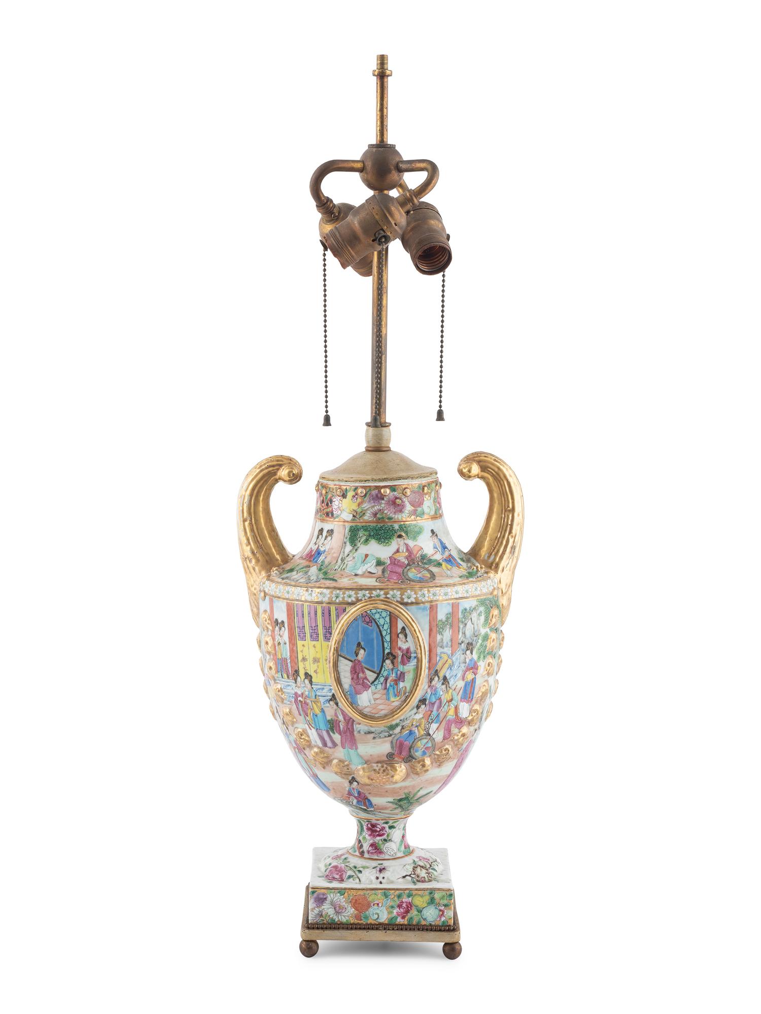 A Chinese Export Parcel Gilt Decorated Famille Rose Porcelain Pistol-Handled Urn