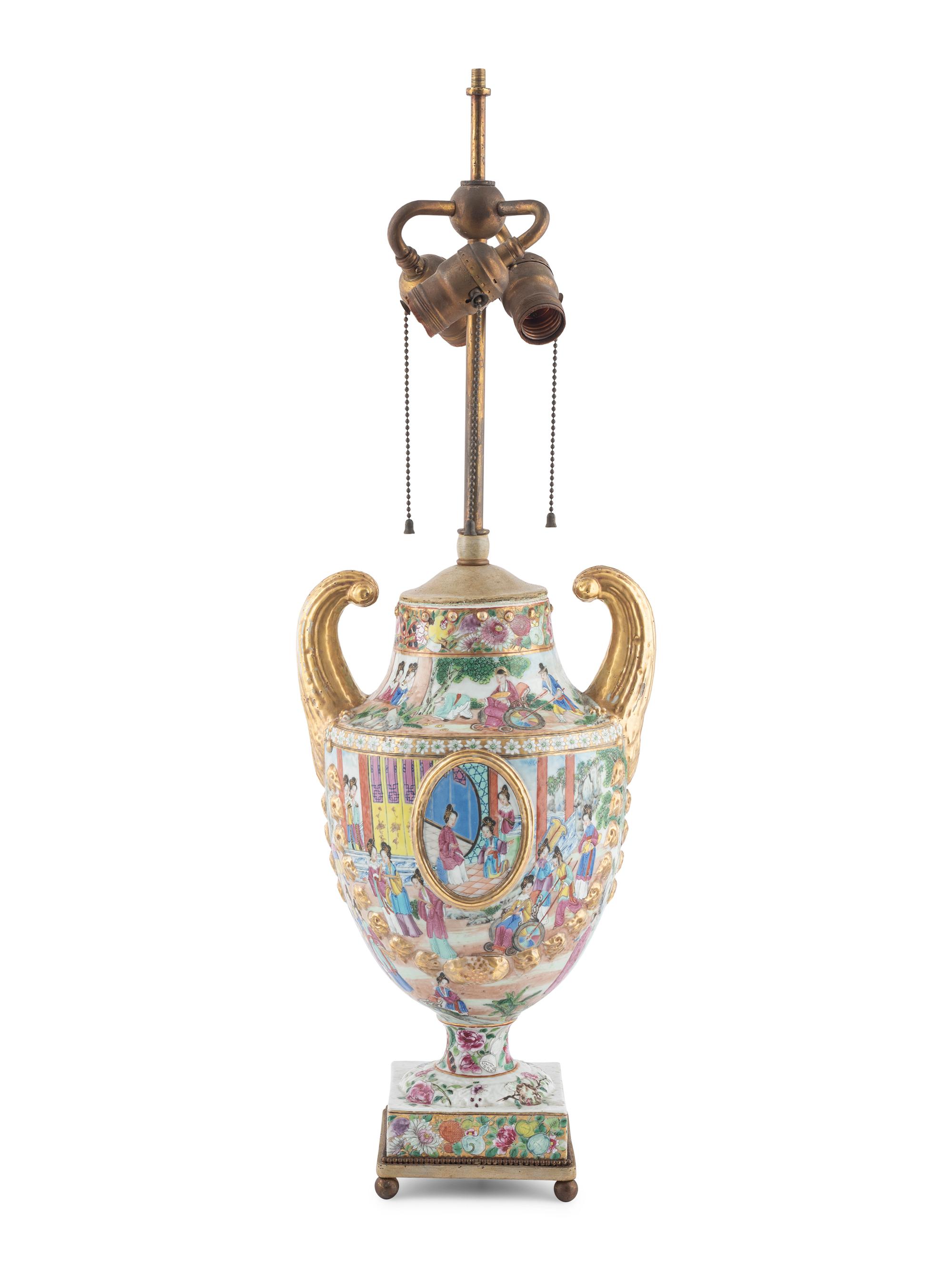 A Chinese Export Parcel Gilt Decorated Famille Rose Porcelain Pistol-Handled Urn