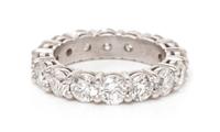 A Platinum and Diamond Eternity Band, 5.90 dwts.