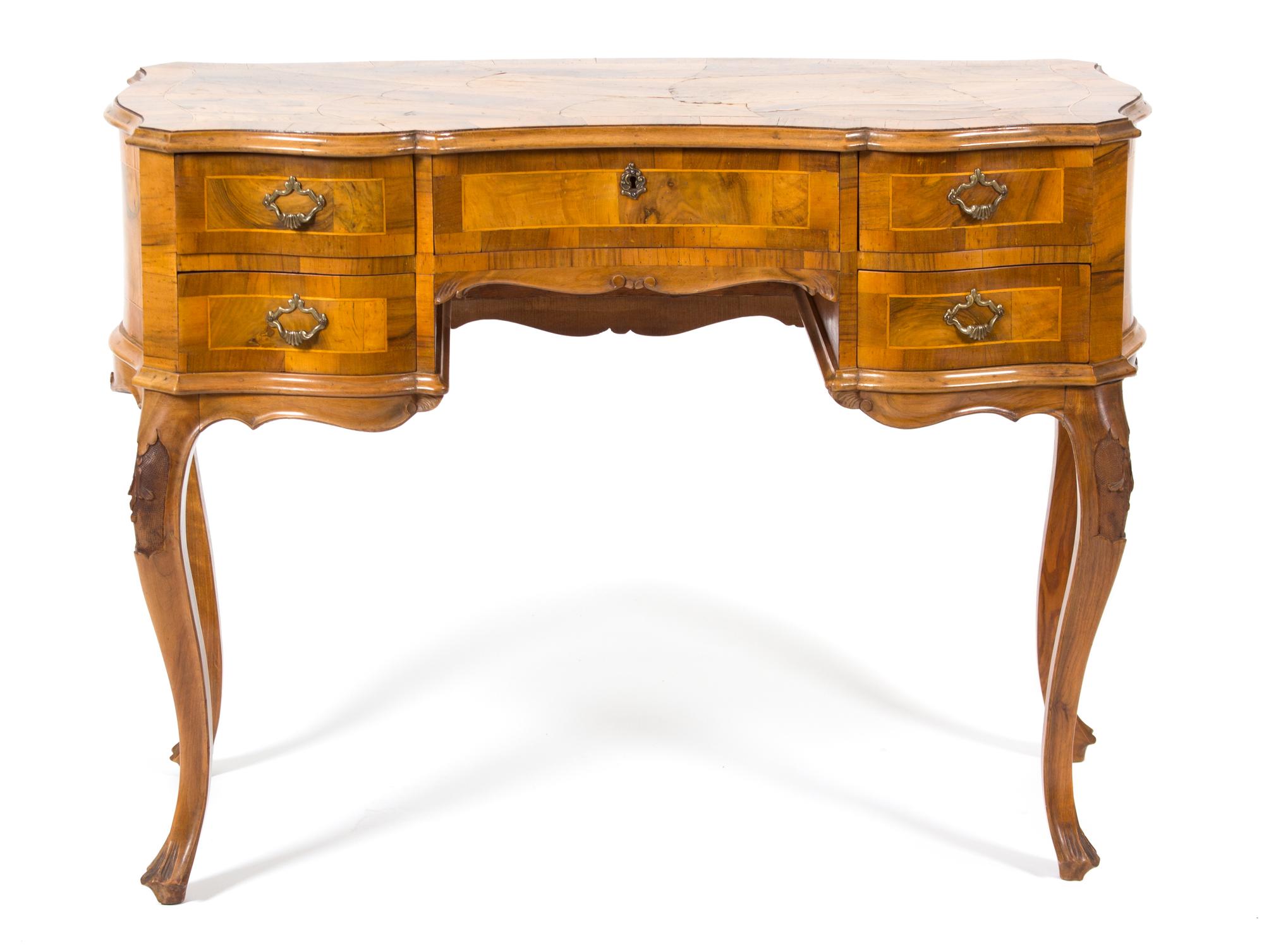 An Italian Rococo Style Walnut Serpentine Desk Height 31 1/4 x width 42 x depth 20 inches. — 20TH CENTURY