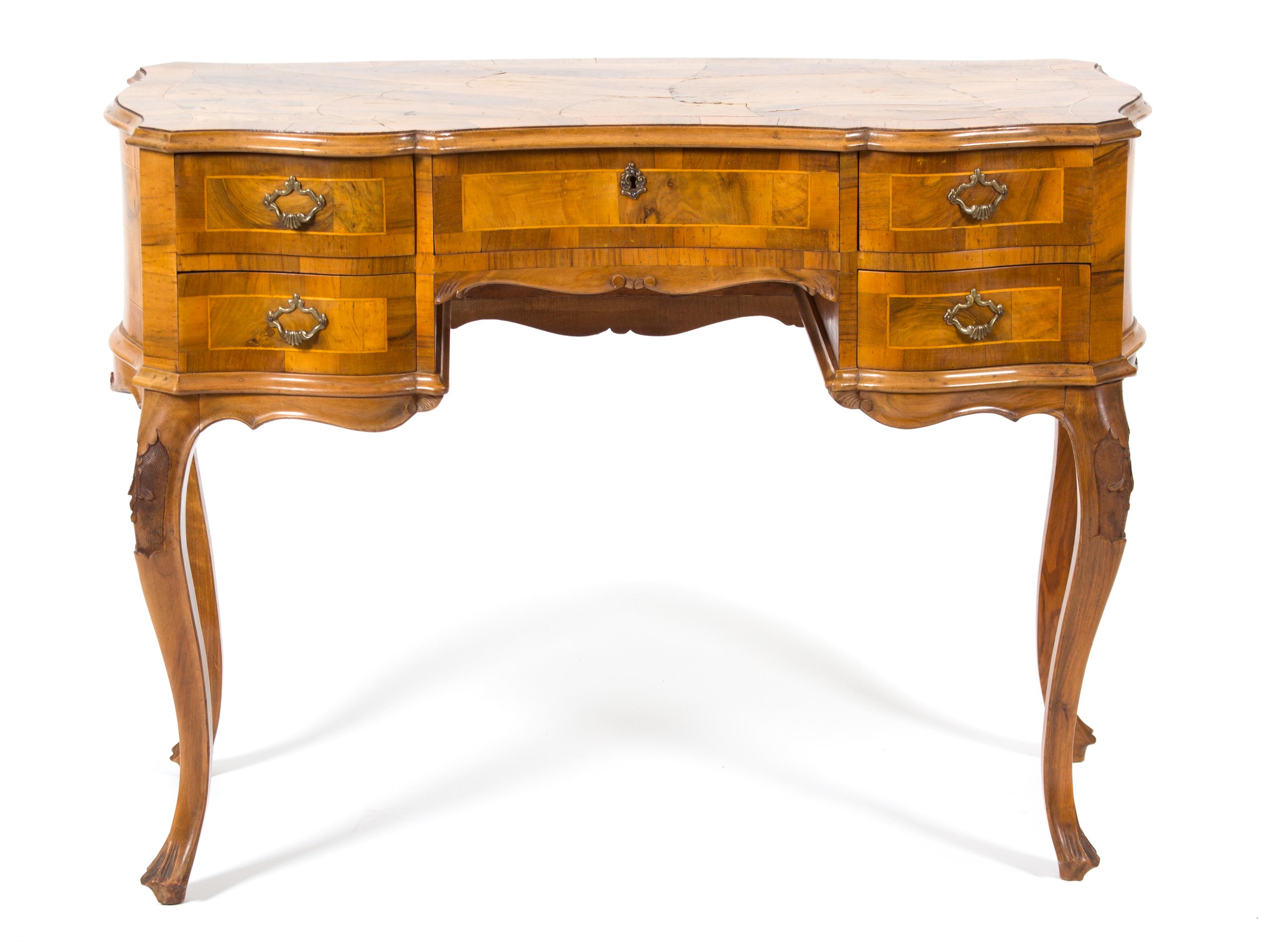 An Italian Rococo Style Walnut Serpentine Desk Height 31 1/4 x width 42 x depth 20 inches. — 20TH CENTURY
