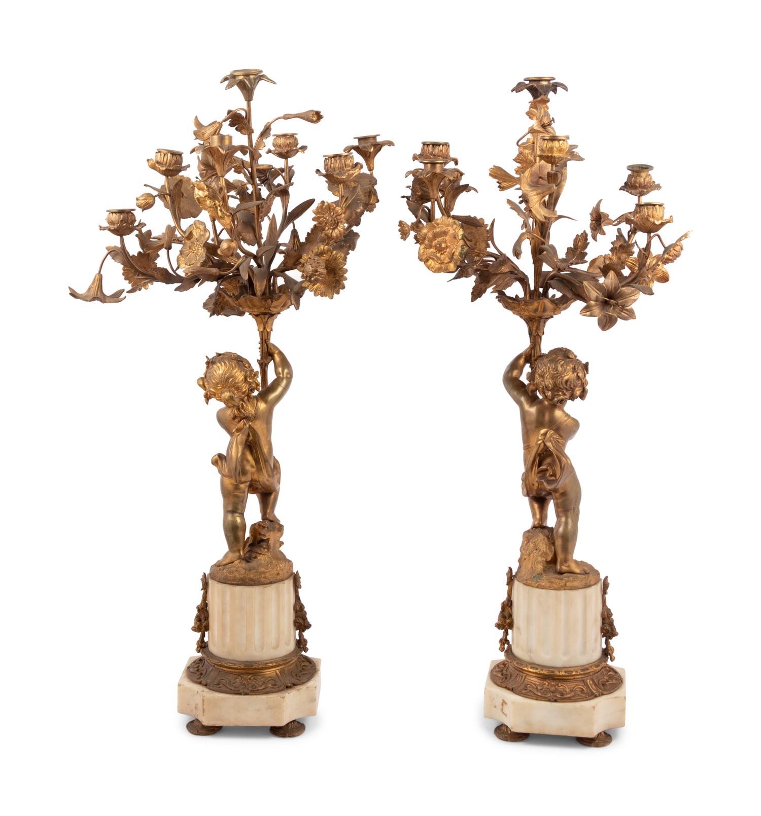 A Pair of French Gilt Bronze and Marble Figural Eight-Light Candelabra