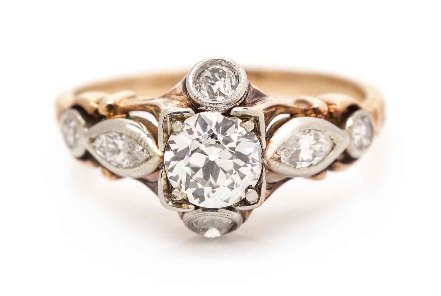 A Platinum Topped Gold and Diamond Ring, 1.70 dwts.