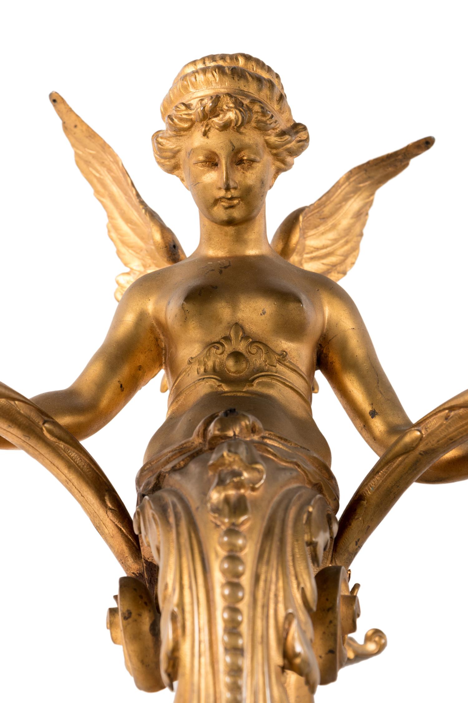 A Pair of French Neoclassical Gilt Bronze Eight-Light Sconces
