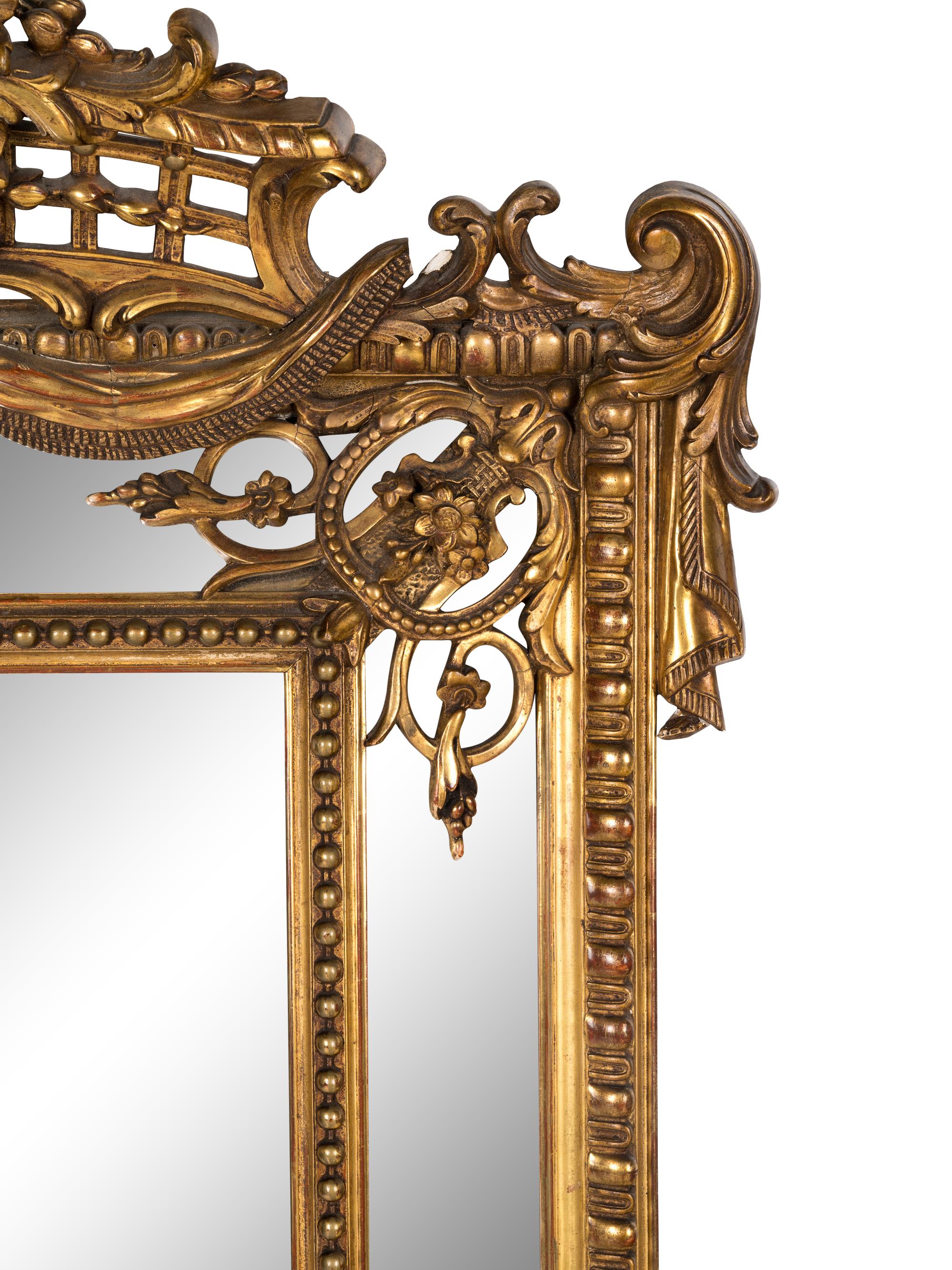 A Rococo Style Giltwood Mirror