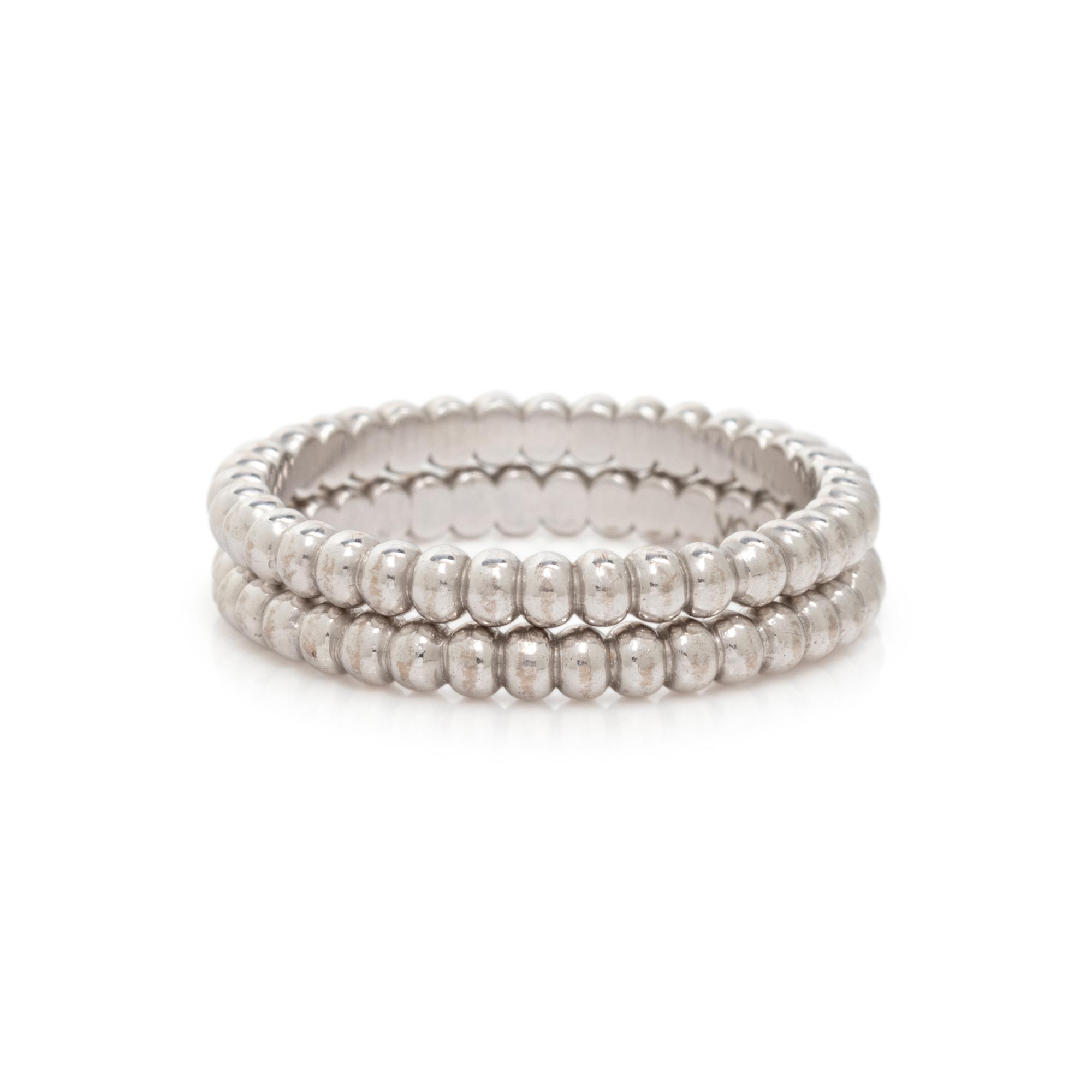 VAN CLEEF & ARPELS, PAIR OF WHITE GOLD 'PERL É E' BANDS