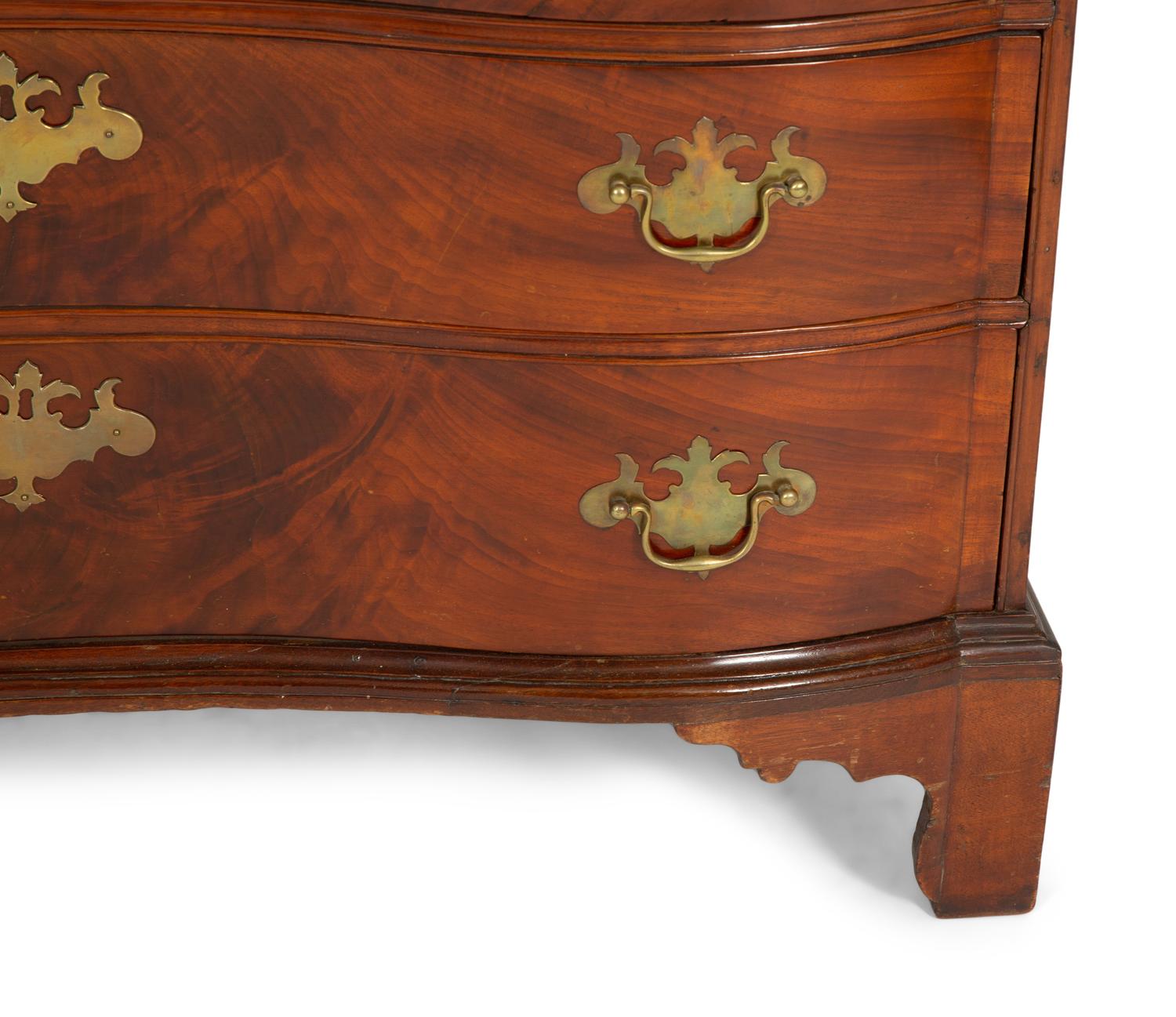 A Chippendale Mahogany Serpentine Drop-Front Desk