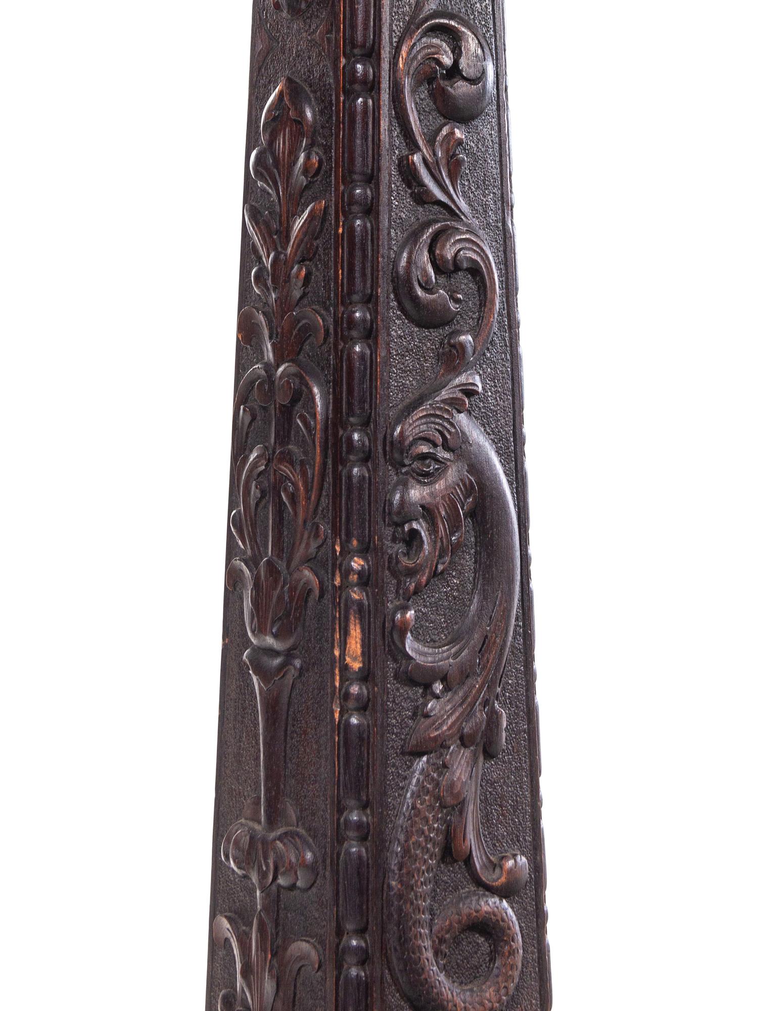A Carved Mahogany Floor Lamp