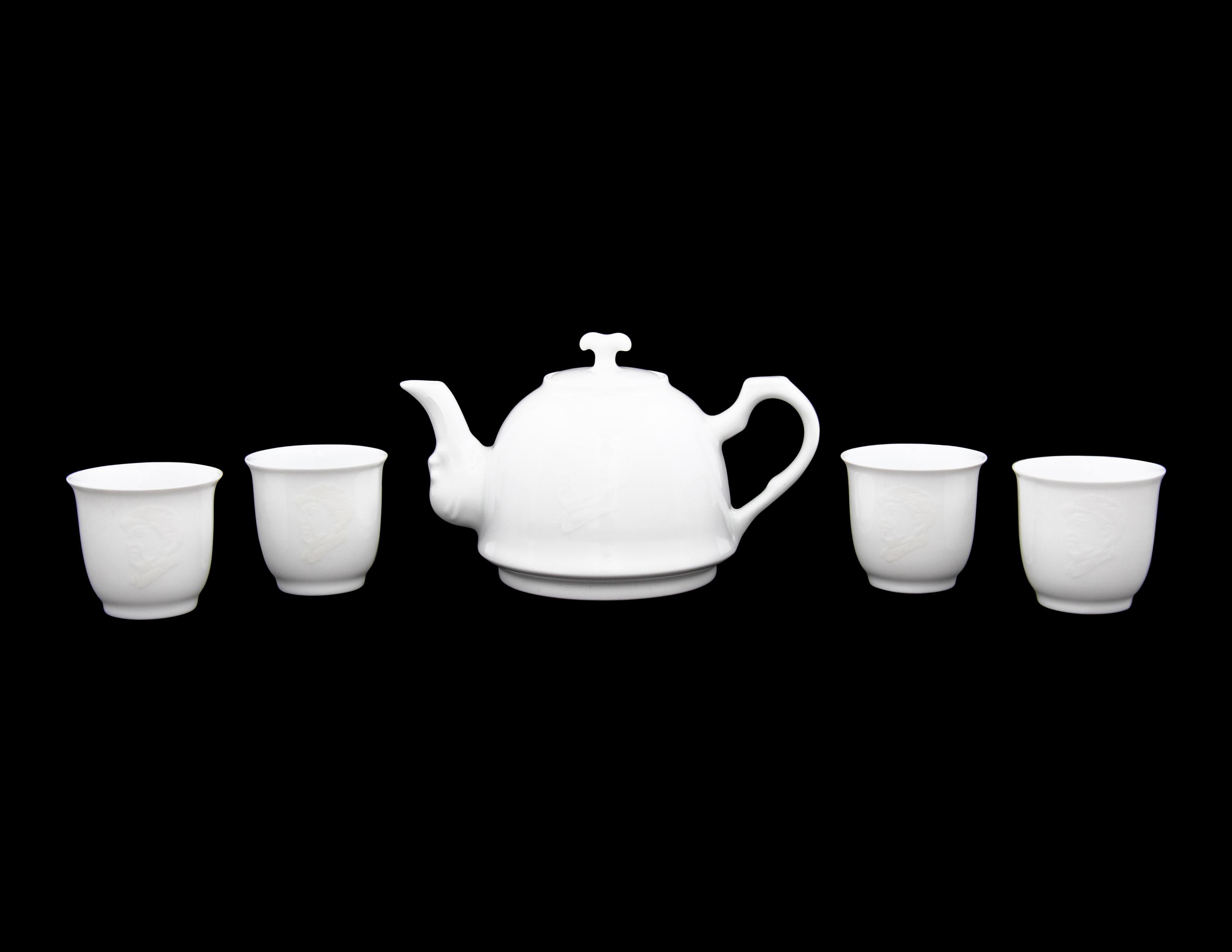 A Set of White Glazed Porcelain Teapot and Tea Cups and A Covered Mug