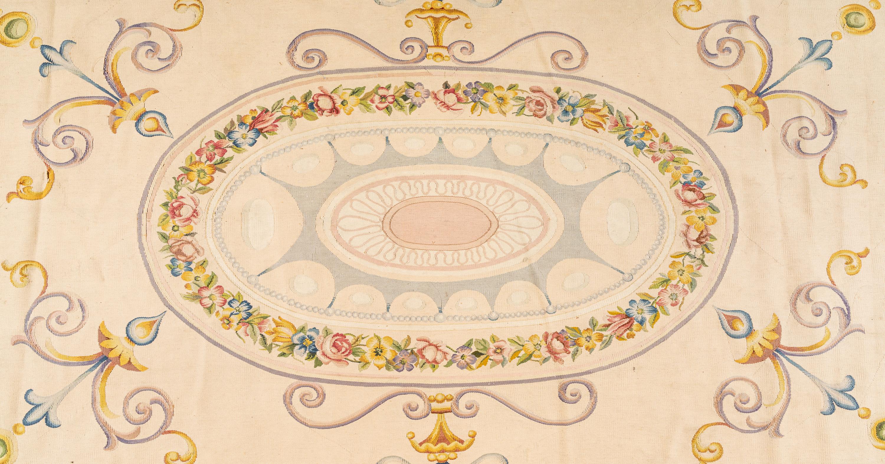An Aubusson Style Oval Rug