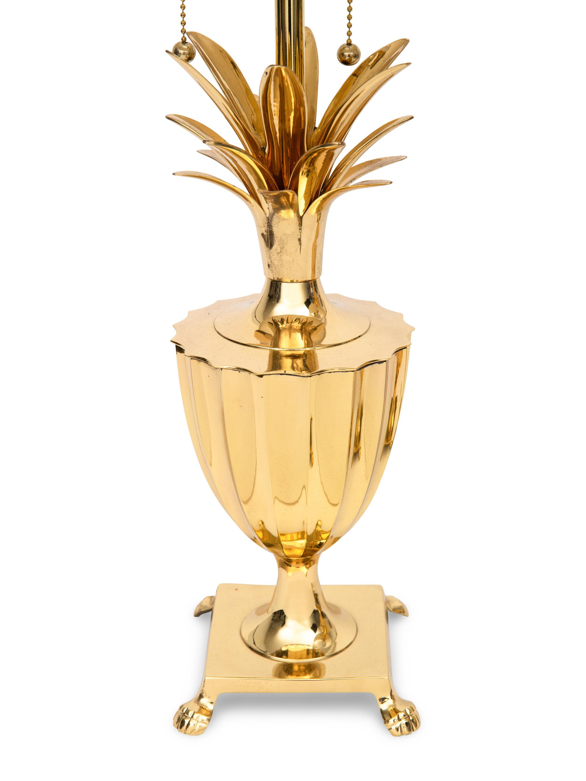 A Pair of Polished Brass Pineapple Lamps
