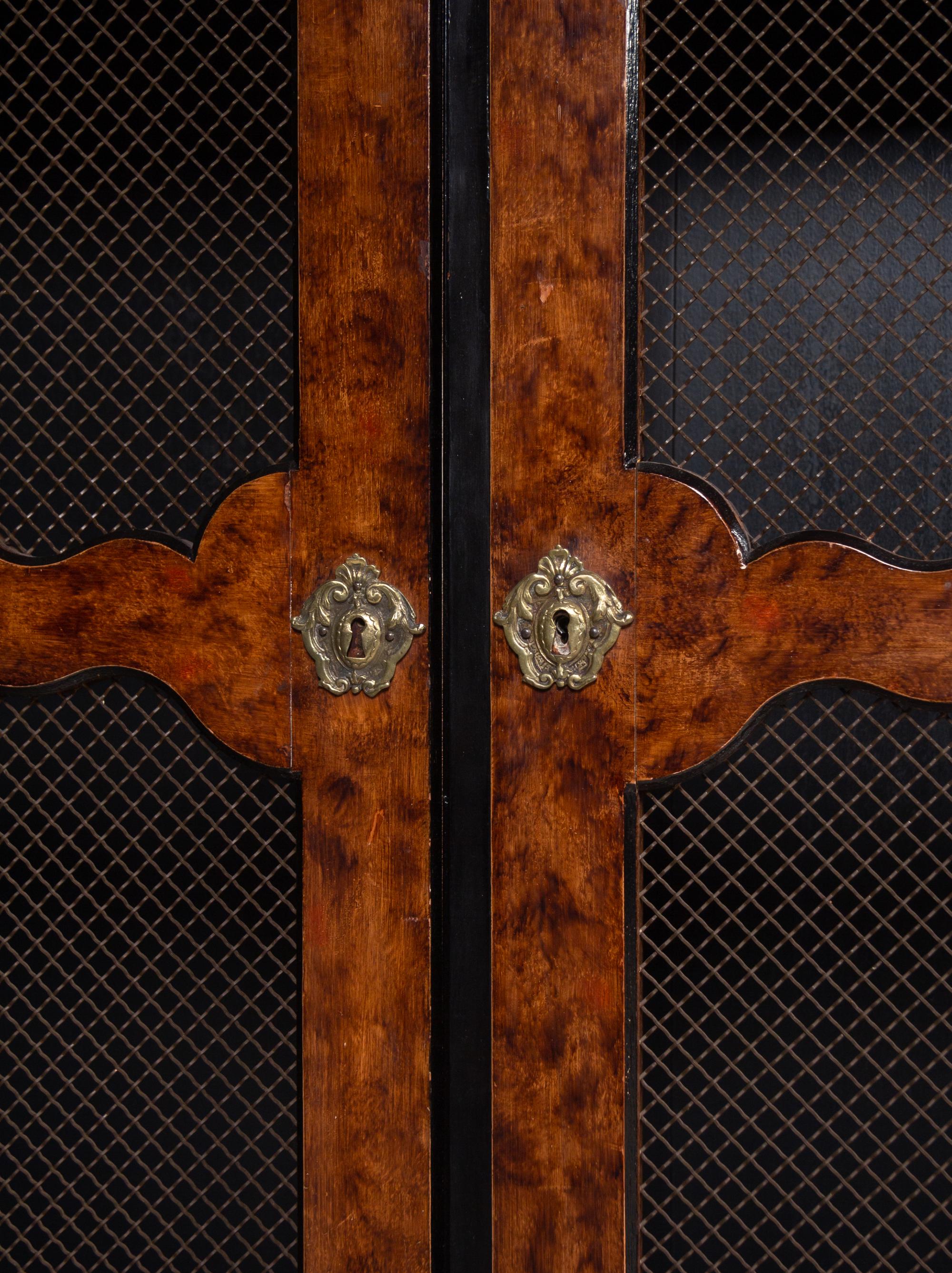 A Pair of Régence Style Faux Bois Painted Bookcases