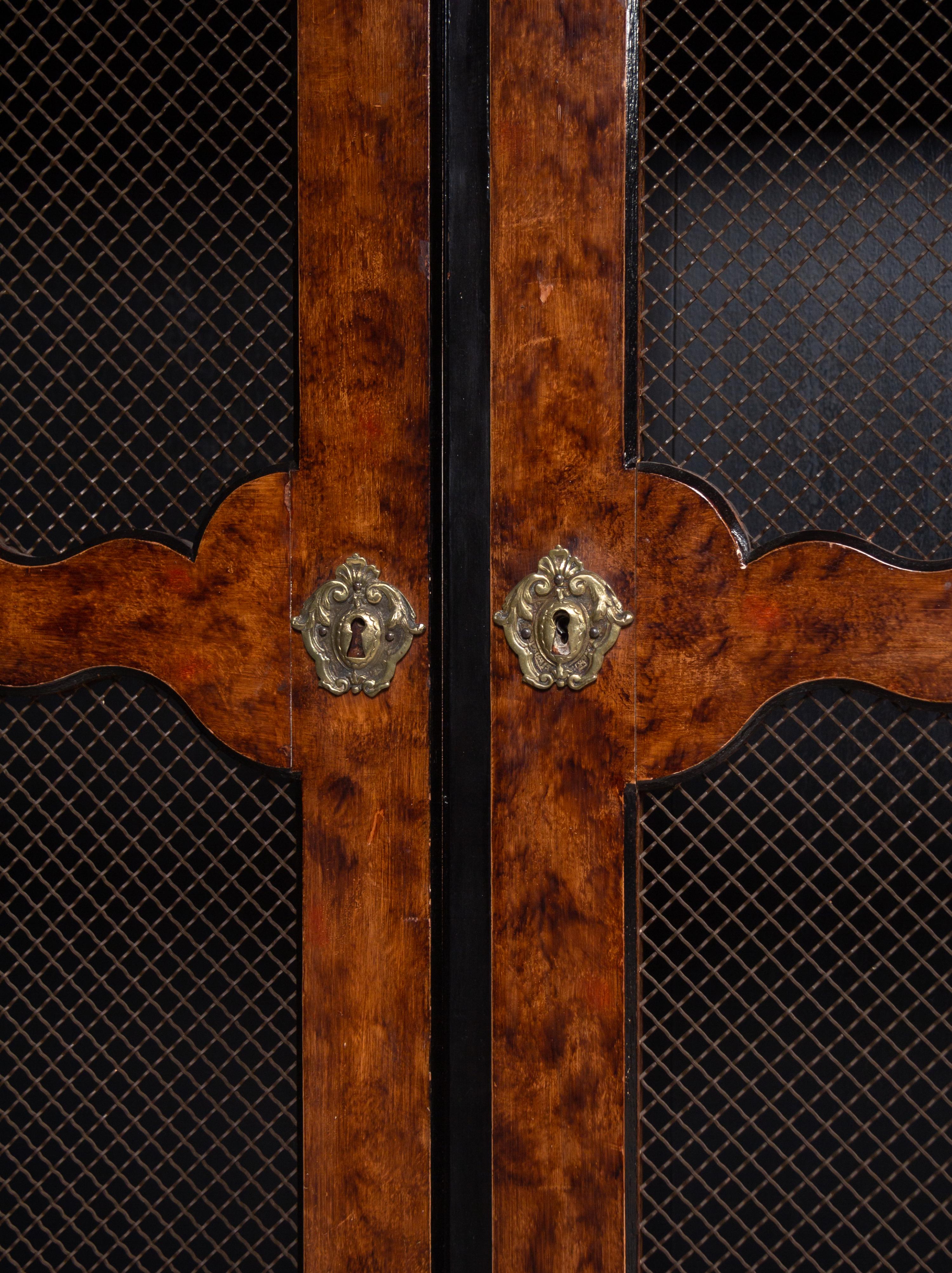 A Pair of Régence Style Faux Bois Painted Bookcases