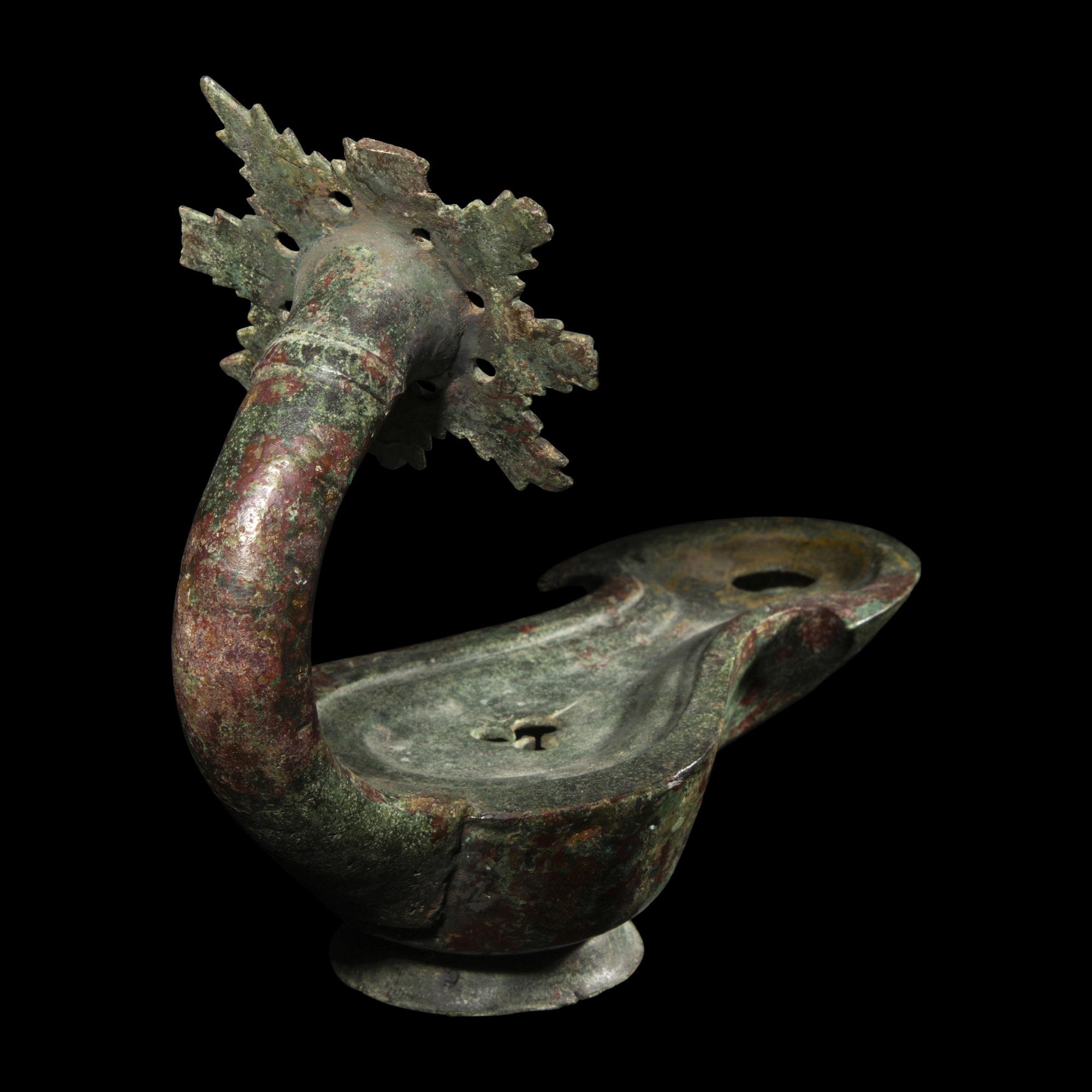 A Roman Bronze Oil Lamp