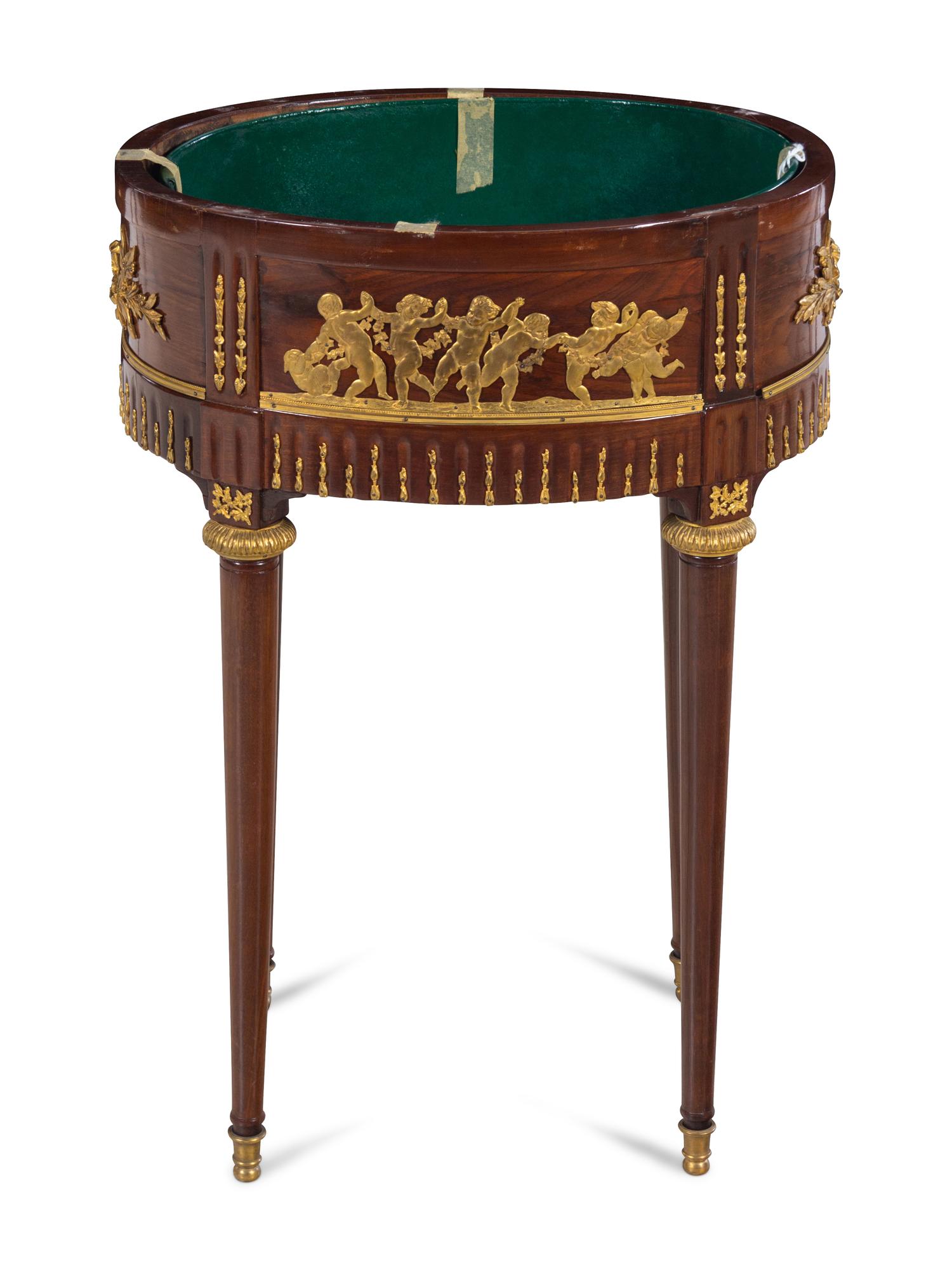 A Louis XVI Style Gilt Metal Mounted Mahogany Tray-Top Side Table