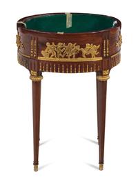 A Louis XVI Style Gilt Metal Mounted Mahogany Tray-Top Side Table