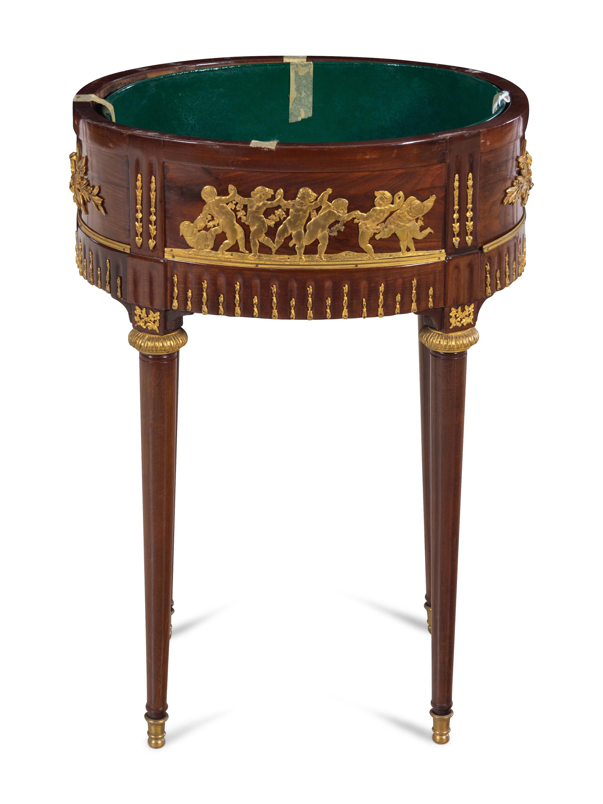 A Louis XVI Style Gilt Metal Mounted Mahogany Tray-Top Side Table