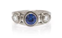 An 18 Karat White Gold, Sapphire and Diamond Ring, 2.90 dwts.