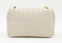 A Judith Leiber Cream Tweed Flap Handbag, 9.5" x 6.5" x 2.5".
