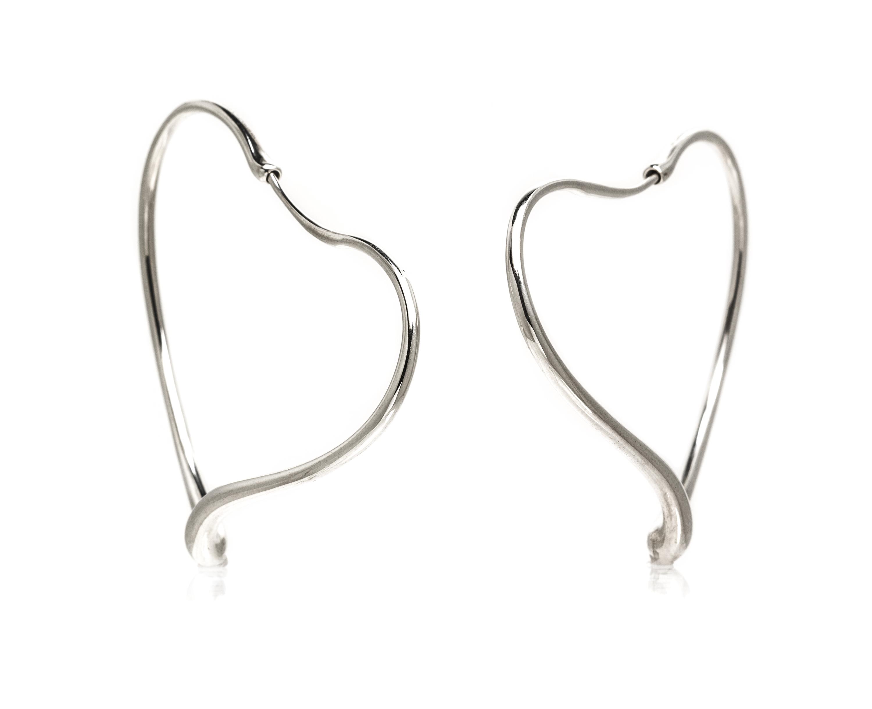 A Pair of Sterling Silver Open Heart Hoop Earrings, Elsa Peretti for Tiffany & Co., 5.90 dwts.