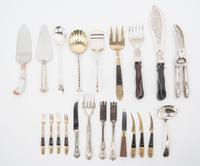 A Group of Silver-Plate Flatware Servers Length of longest 13 1/2 inches.