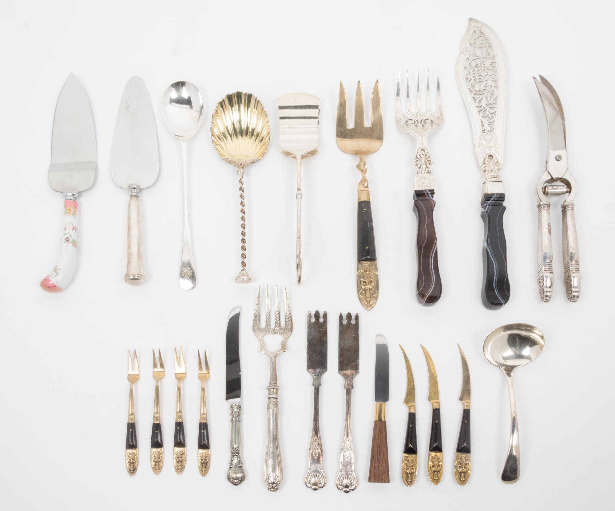 A Group of Silver-Plate Flatware Servers Length of longest 13 1/2 inches.