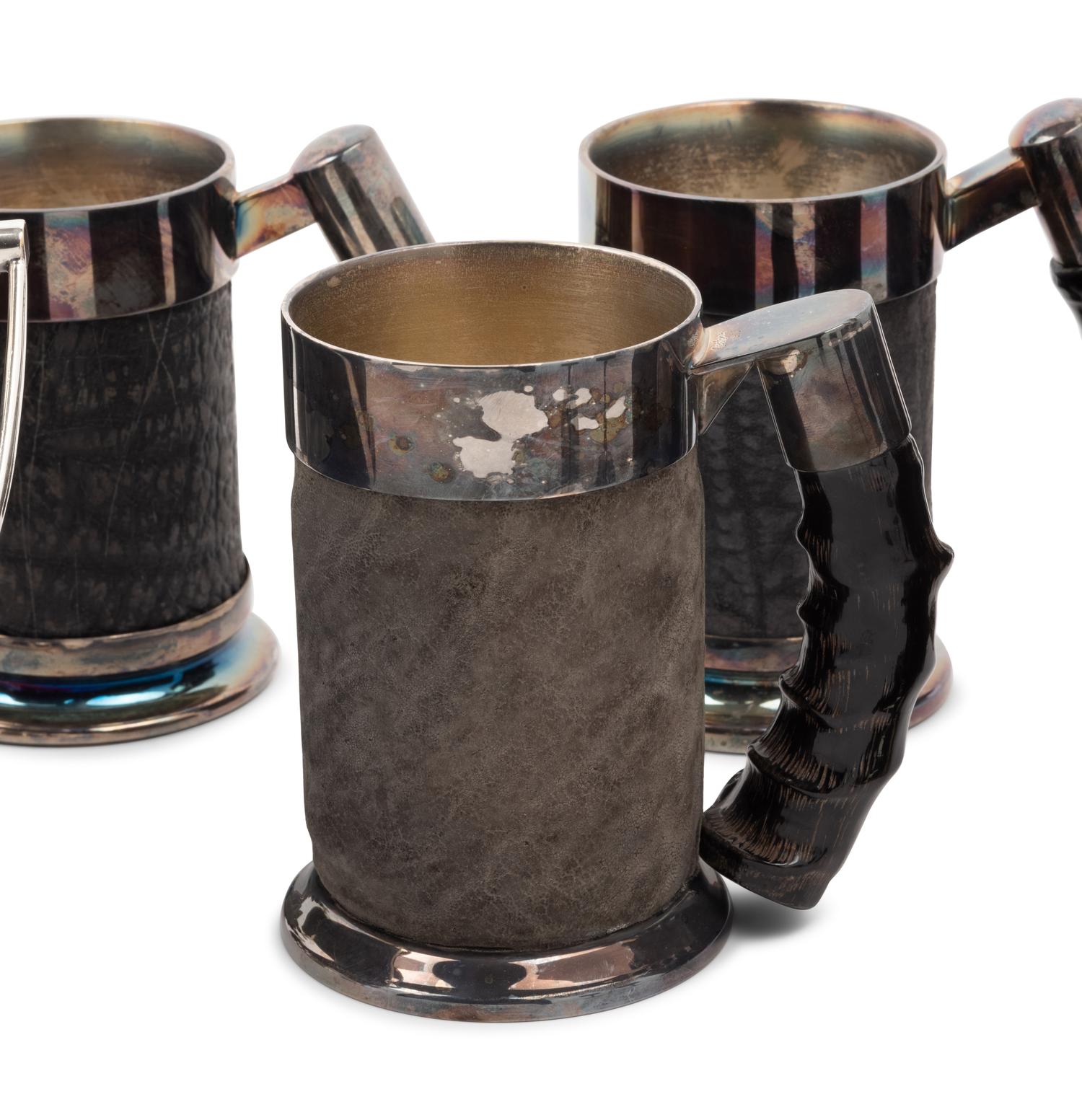 A Set of Silver-Plate and Hide Drinkware