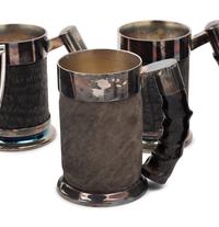 A Set of Silver-Plate and Hide Drinkware