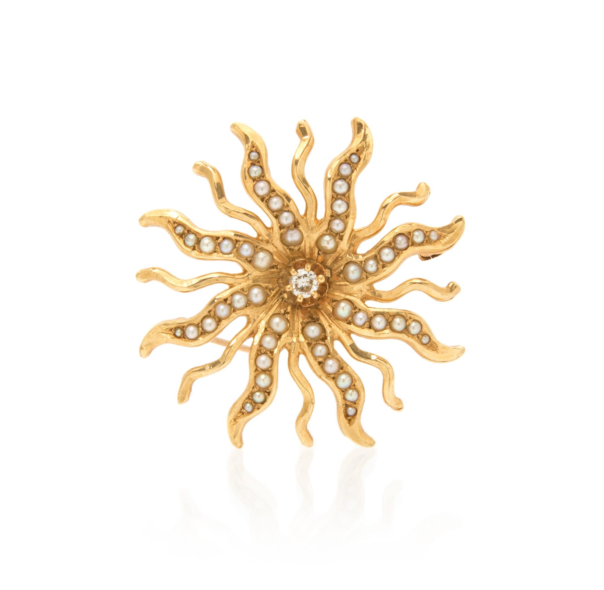 A 14 Karat Yellow Gold, Diamond, and Seed Pearl Sunburst Brooch, 6.80 dwts.