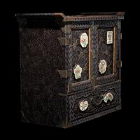 A Japanese Porcelain and Metal Inset Wood Chest