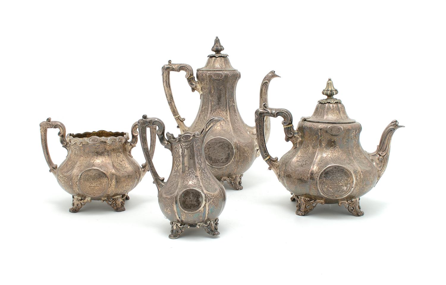 An English Silver Four Piece Tea and Coffee Service, London, Height of tallest 11 inches.