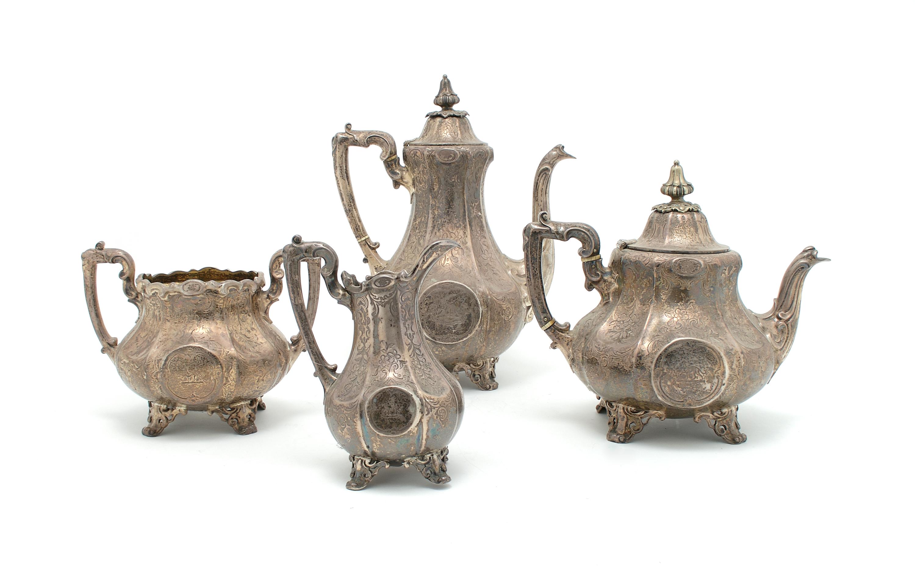 An English Silver Four Piece Tea and Coffee Service, London, Height of tallest 11 inches.