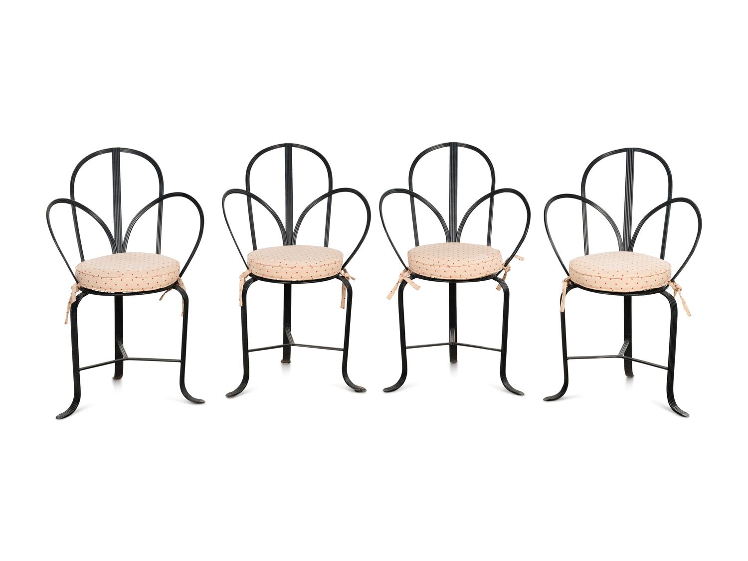 A Set of Four Steel Café Chairs