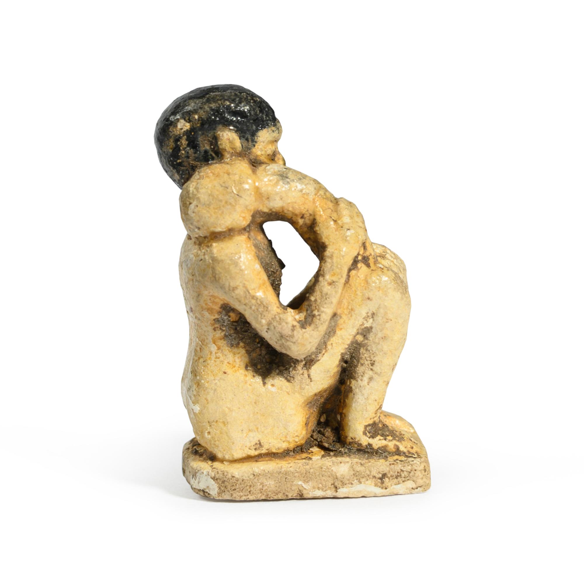 An Egyptian Two-Tone Faience Eroticon