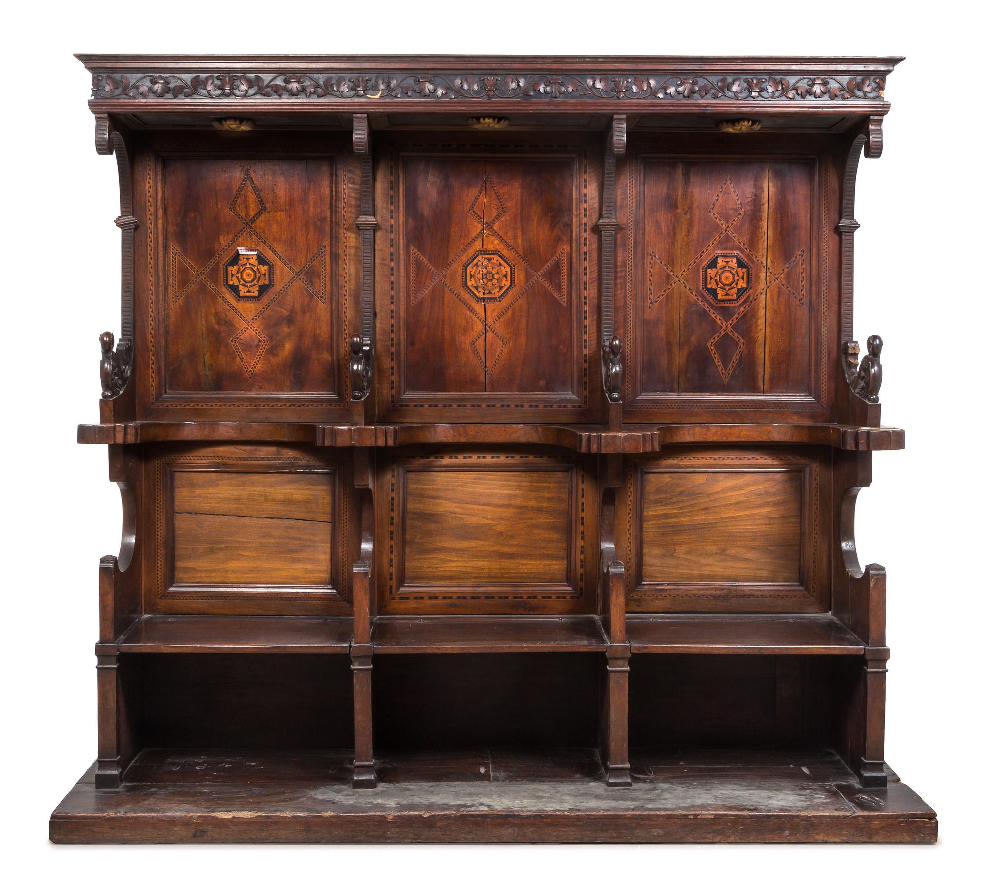 An Italian Walnut Choir Stall Height 84 1/4 x width 94 x depth 25 1/4 inches. — LATE 15TH CENTURY WITH LATER ELEMENTS